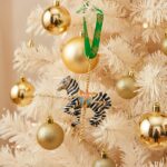 Carousel Zebra ornament hanging on a Christmas Tree